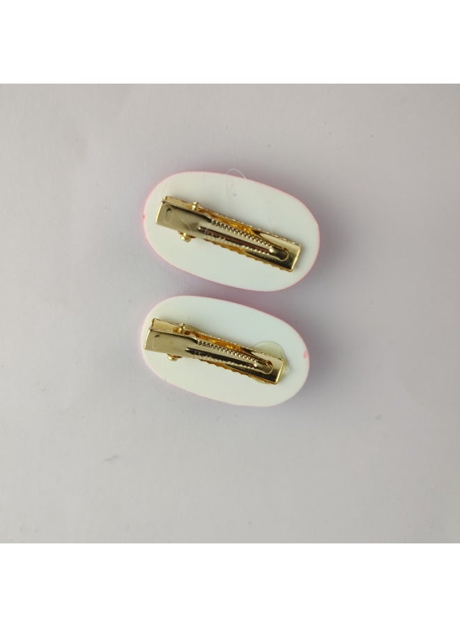 عرض 2 توكة شعر كلبس شكل قلوب أنيقة – تصميم جذاب وثبات مميز - Image 2